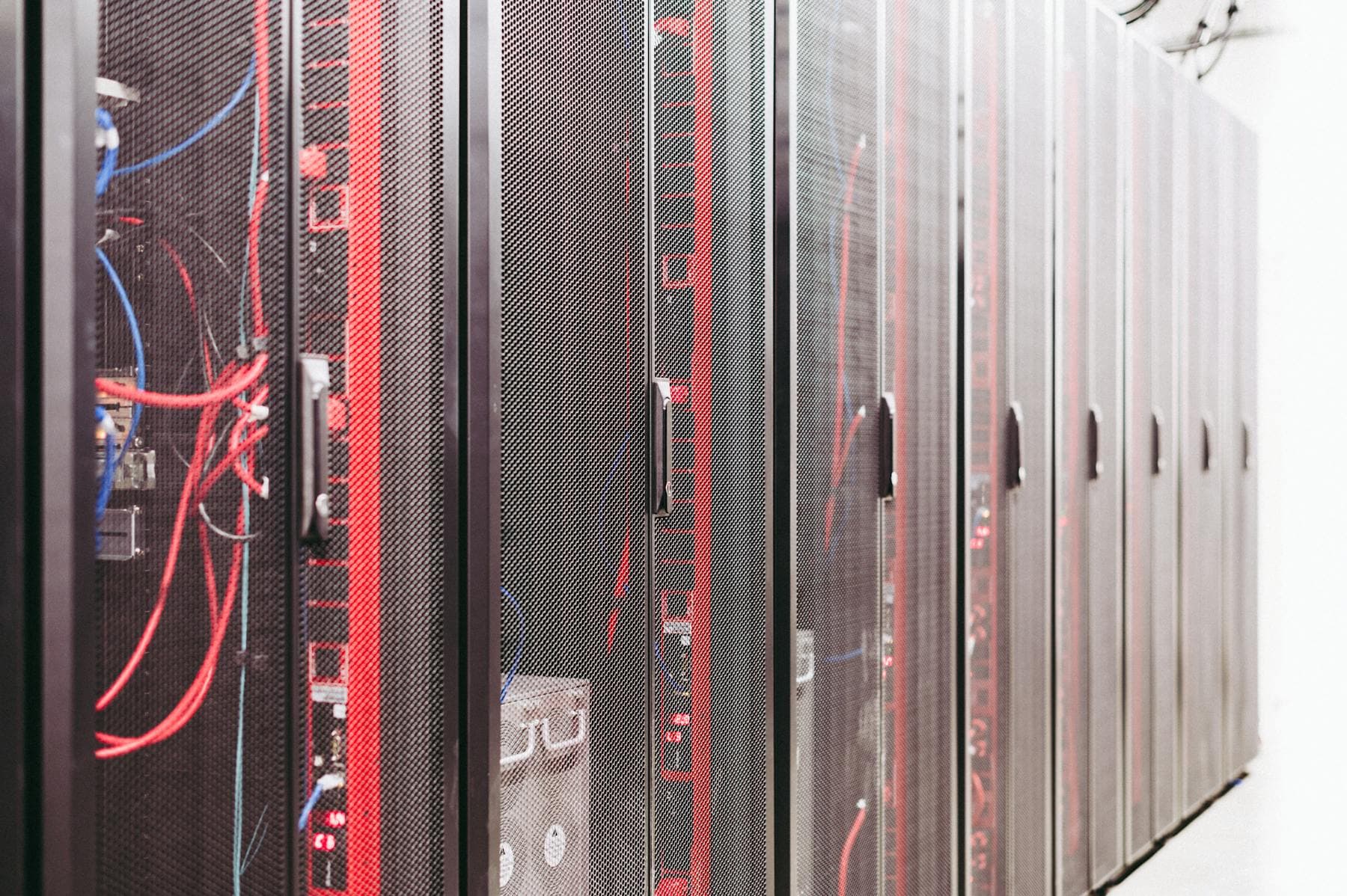 Rows of server racks representing capable self-hosted and homelab infrastructure.