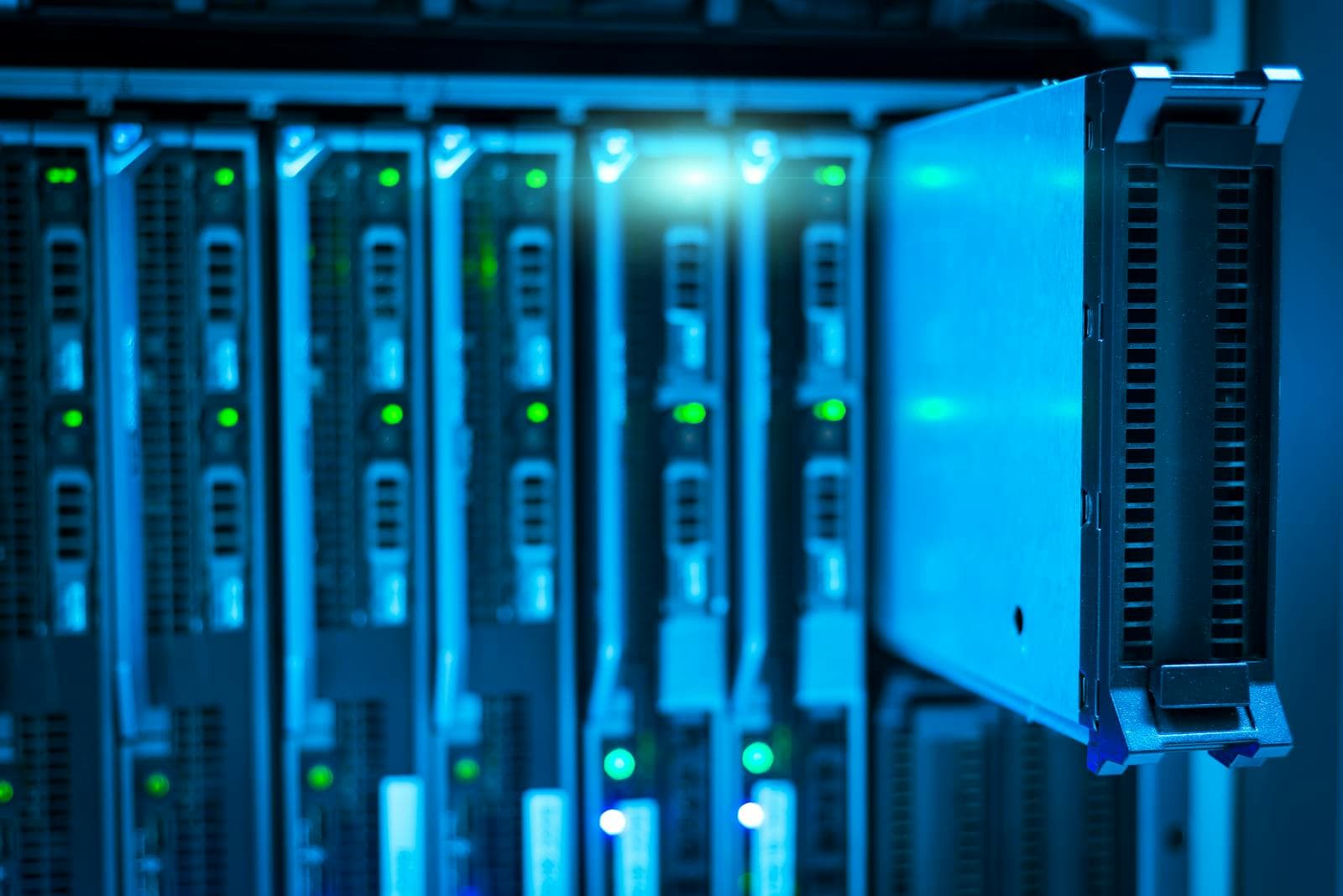 A blue-lit server rack representing private infrastructure and data ownership.
